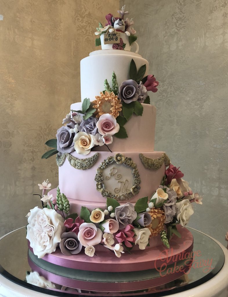 4 tier wedding cake with sugar flowers